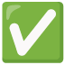a green square with a white check mark inside of it .